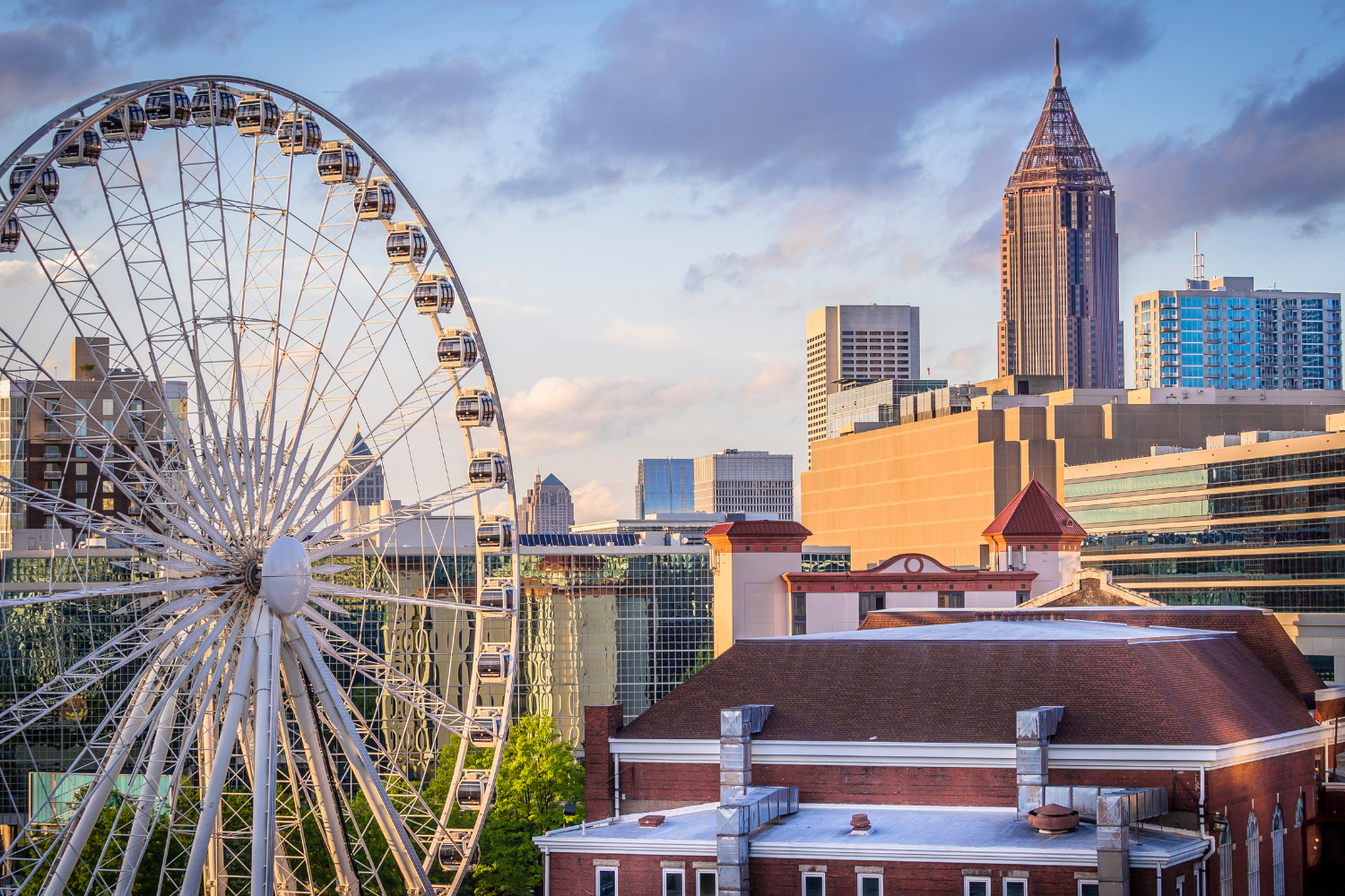 Atlanta skyline featuring the iconic Ferris wheel and modern buildings, highlighting the vibrant city atmosphere and local business opportunities.